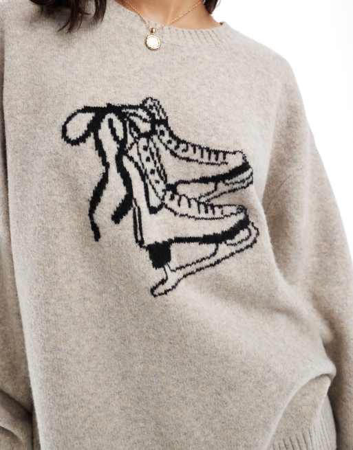 Ice skating sweater clearance