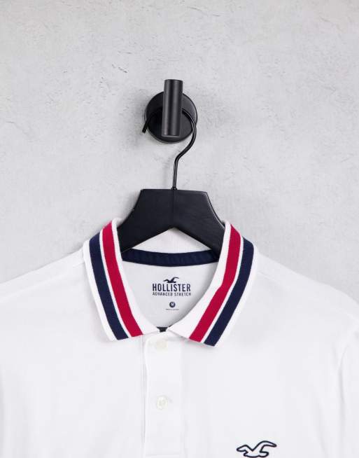 Hollister icon logo chest & collar stripe polo in white, 3 of 4