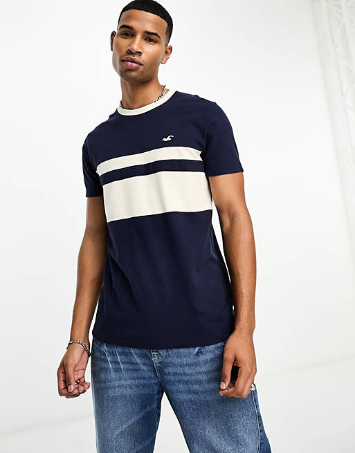 Hollister icon logo chest stripe muscle fit pique t-shirt in navy | ASOS