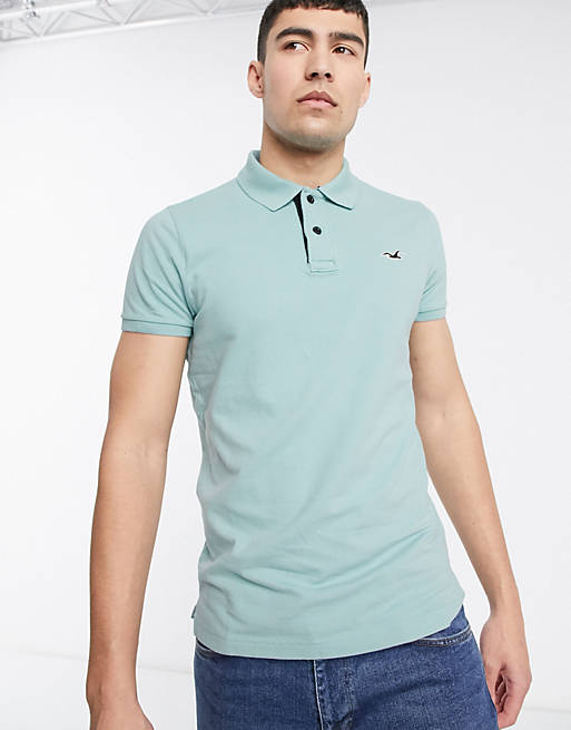 Hollister icon logo heritage slim fit pique polo in mint | ASOS