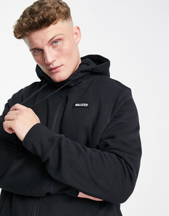 https://images.asos-media.com/products/hollister-icon-logo-sherpa-lined-full-zip-hoodie-in-black/201331976-4?$n_550w$&wid=550&fit=constrain