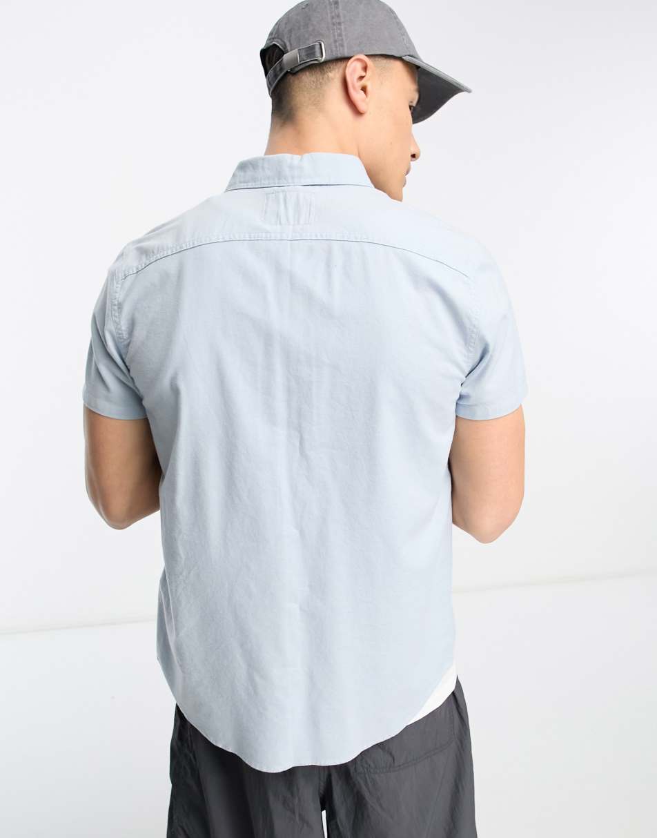 Hollister icon logo short sleeve oxford shirt in light blue 1
