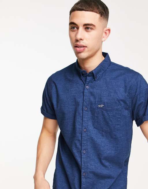 Hollister icon logo short sleeve slim fit shirt in navy ASOS