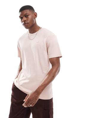 Hollister Hollister icon logo textural grid relaxed fit t-shirt in pink