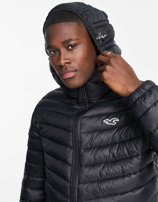 Nike classic padded tape jacket with hood in black, ASOS