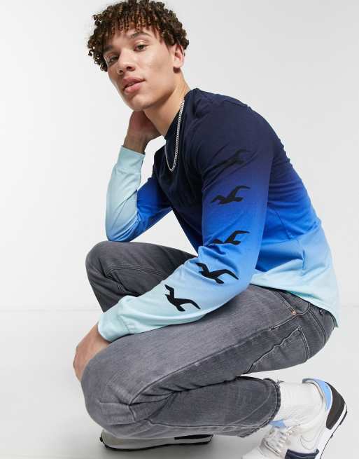 Hollister iconic front and arm logo ombre long sleeve top in navy