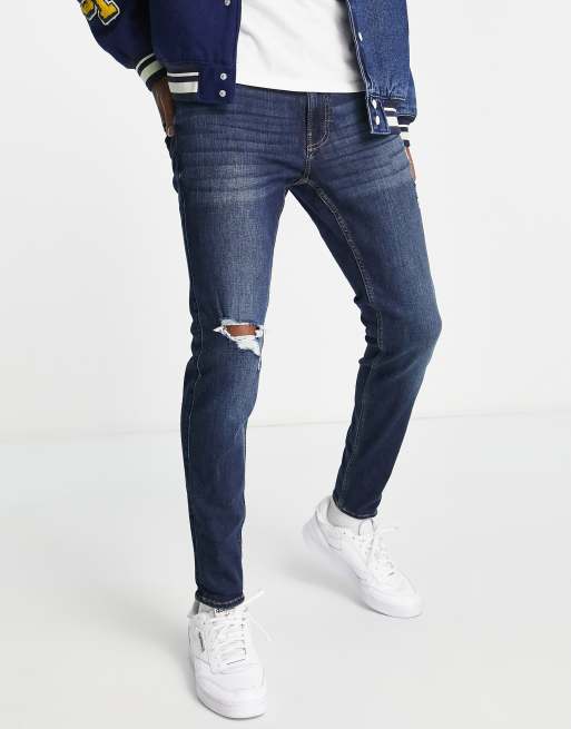 Hollister Jeans superskinny effetto invecchiato con strappi lavaggio scuro intenso
