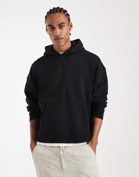 Hollister – Kapuzenpullover in Schwarz mit eingearbeitetem Logo - view 1