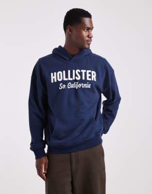 Hollister - Kastiger Frottee-Kapuzenpullover in Marineblau mit Logo