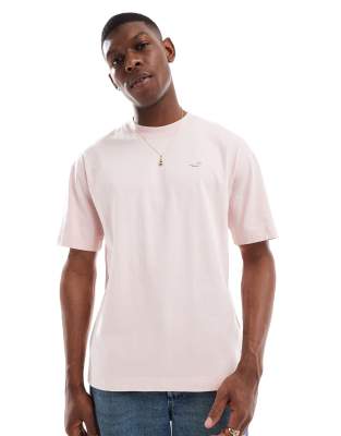 Hollister – Kastiges T-Shirt in verwaschenem Hellrosa mit Markenlogo - view 1