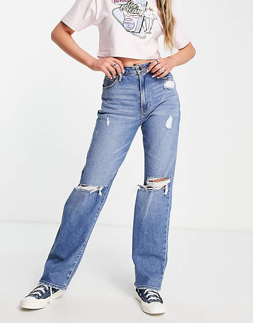 Hollister knee rip jeans in mid wash blue