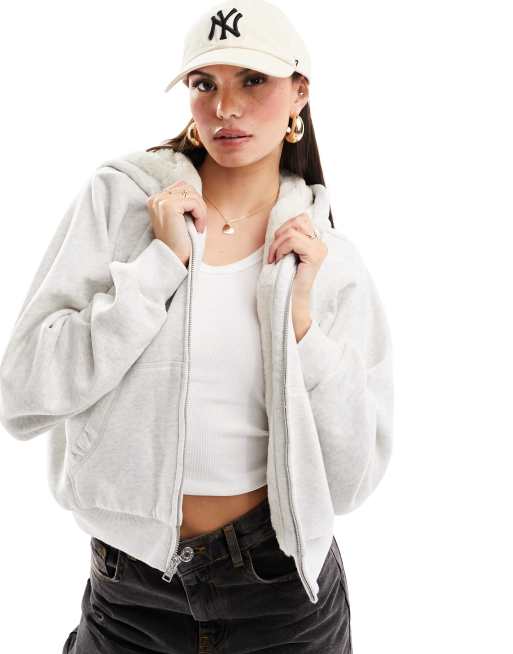 Hollister - Knusse hoodie met imitatiebont voering en rits in lichtgrijs