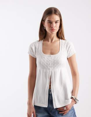 Hollister - Kurzärmliges Babydoll-Oberteil in Weiß im Korsettdesign