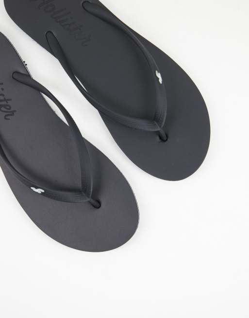 Hollister black flip flops sale