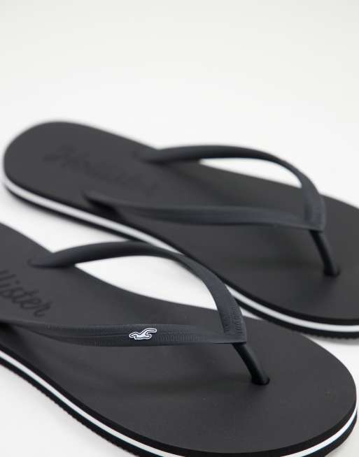 Hollister black discount flip flops