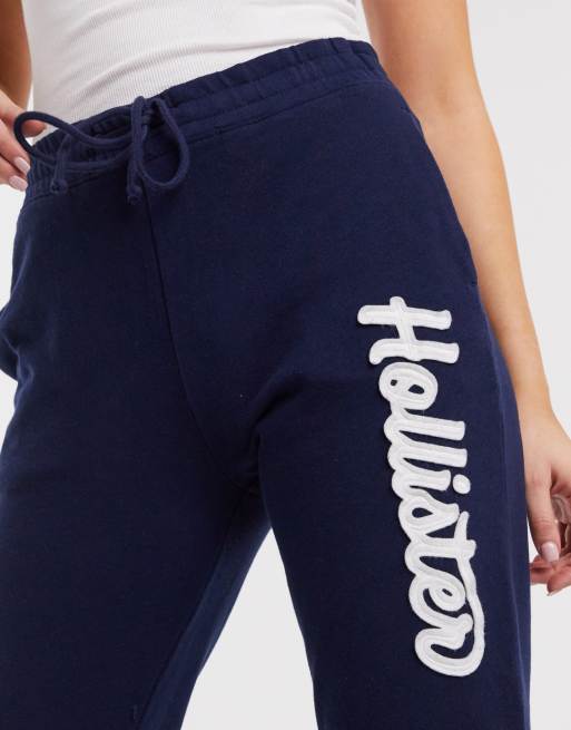 Hollister Logo Banded Sweatpants ($40) ❤ liked on Polyvore featuring  activewear, activewear pants, navy, log…