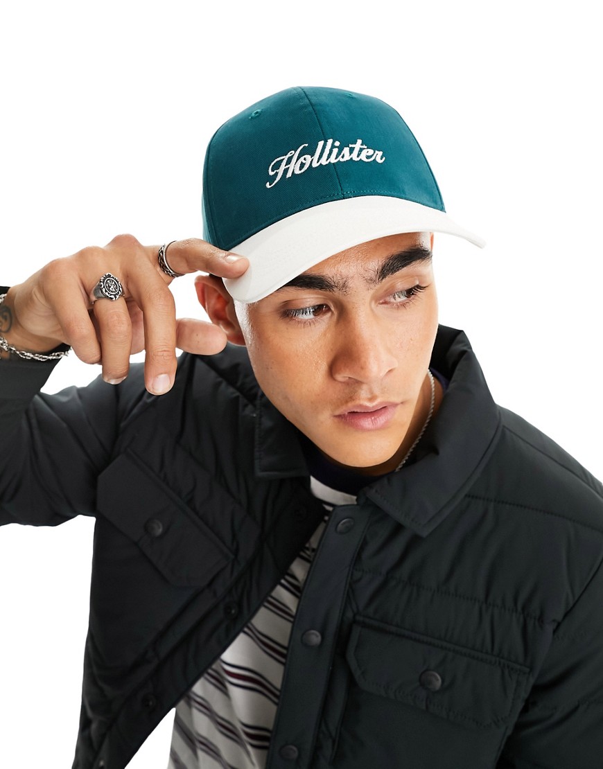 Hollister logo snapback baseball cap in green/white