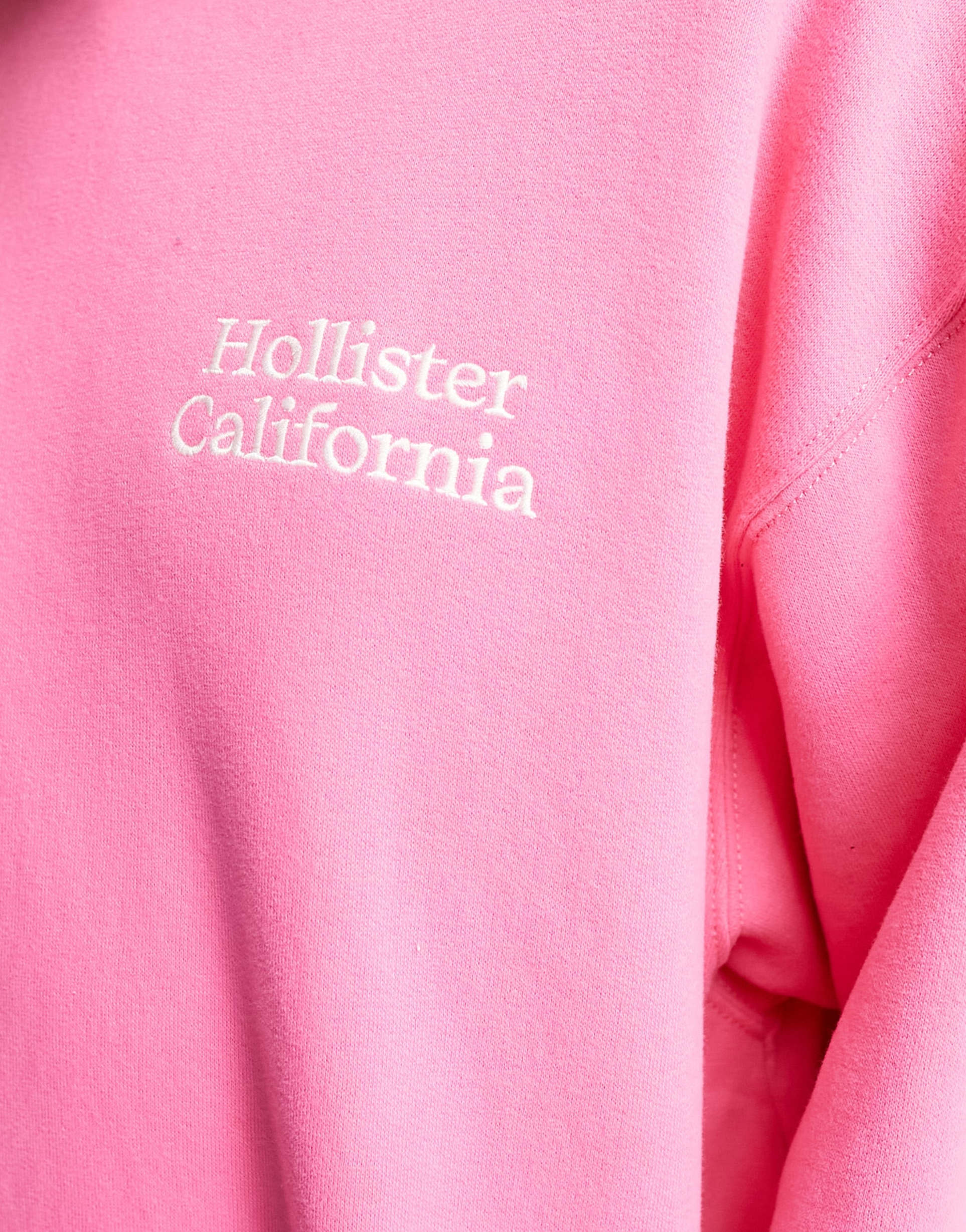 Hollister long sleeve crew neck jumper in pink view 3