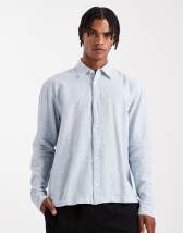 ASOS DESIGN boxy oversized cord shirt with chest embroidery in khaki