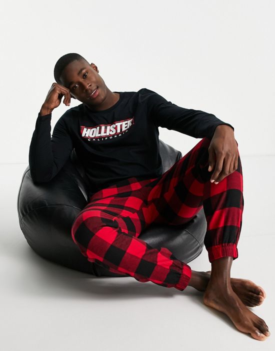 https://images.asos-media.com/products/hollister-lounge-set-sweatpants-and-long-sleeve-top-in-red-check-black-with-logo/201562932-1-multi?$n_550w$&wid=550&fit=constrain