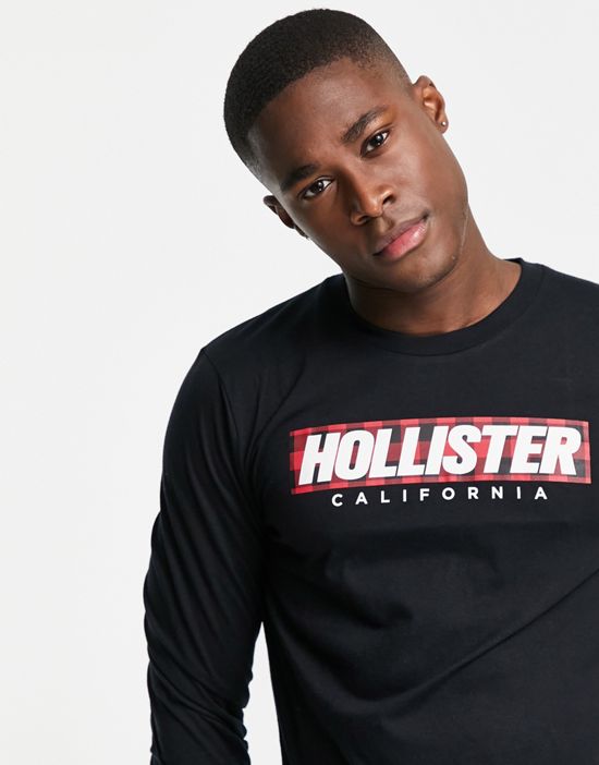https://images.asos-media.com/products/hollister-lounge-set-sweatpants-and-long-sleeve-top-in-red-check-black-with-logo/201562932-3?$n_550w$&wid=550&fit=constrain