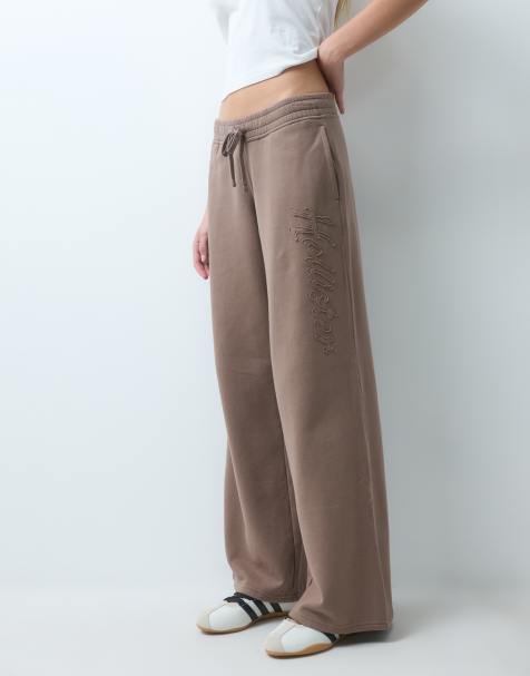 Hollister low rise baggy trackies with side logo graphic in light brown - view 1