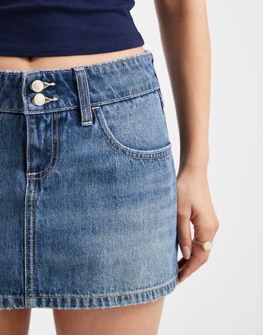 Hollister low rise chop pocket denim mini skirt in mid blue wash