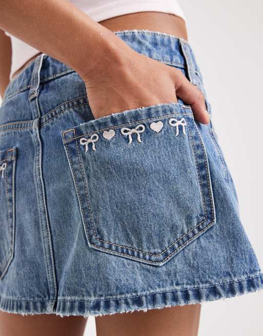 Hollister low rise denim embroidered mini skirt in mid blue wash