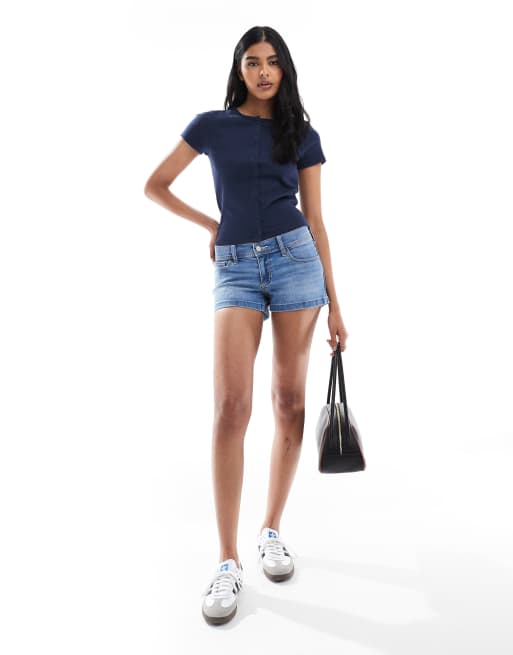 Hollister low rise slit hem mini denim shorts in medium blue wash
