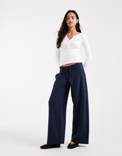 Hollister low rise wide leg trackies in navy, 1 of 5