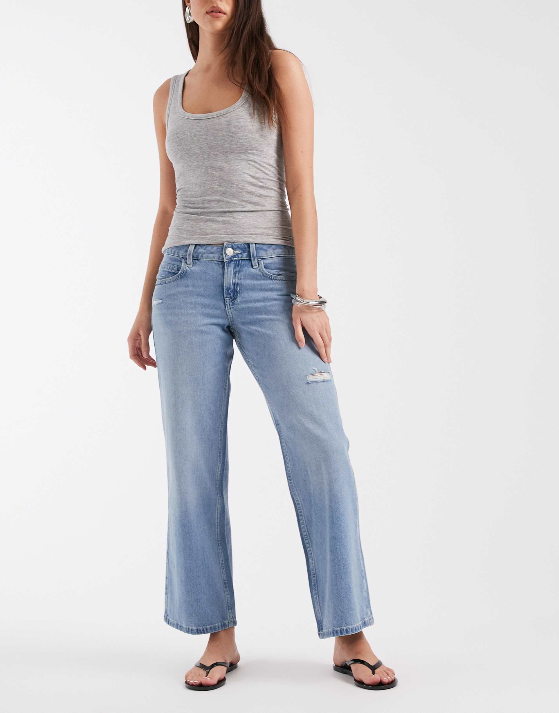 hollister low waist ripped baggy jeans in light blue wash