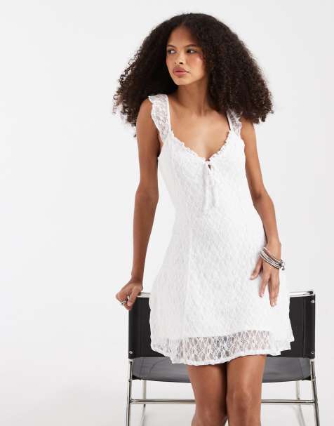 Hollister – Luftiges Minikleid aus weißer Spitze mit gebundener Vorderseite - view 1