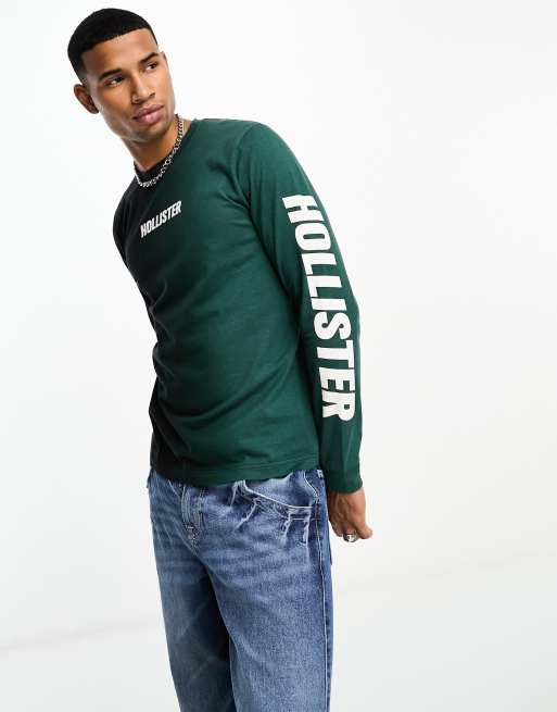 Hollister Maglietta a maniche lunghe verde e nera con logo verticale sulla manica ASOS