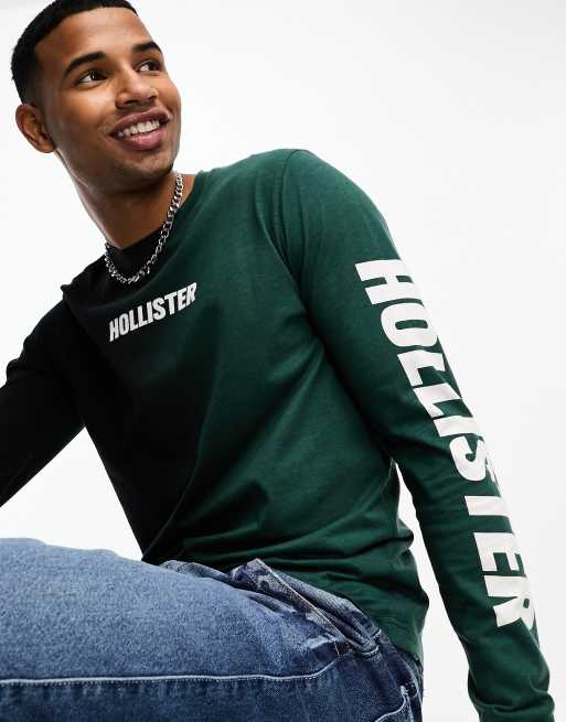 Hollister Maglietta a maniche lunghe verde e nera con logo verticale sulla manica ASOS