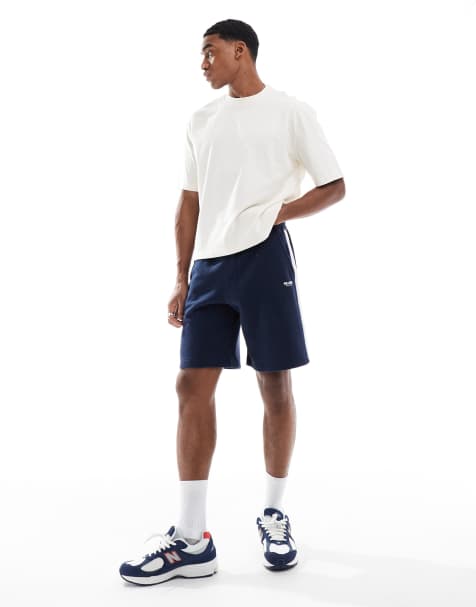 Hollister – Marinblå shorts med collegelogga, sidorand och ledig passform - view 1