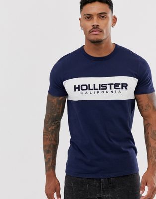 Hollister – Marinblå t-shirt med bröstpanel och tech-logga