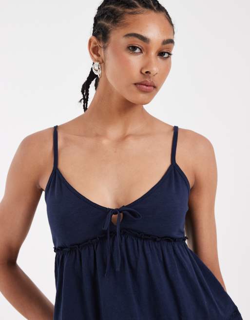 Hollister - Marineblå babydoll-top med cami-stropper og bindebånd foran