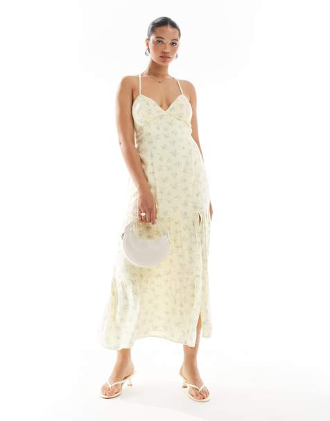 Hollister – Maxikleid in Gelb mit Rückenausschnitt, hohem Schlitz und Blümchenprint - view 1
