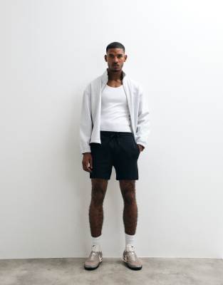 Охлаждающие трикотажные шорты Hollister до середины бедра черного цвета black
