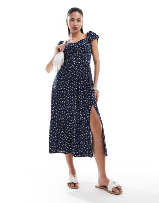 Hollister - Midi jurk met bloemenprint, fladdermouwen en V-taille in marineblauw 