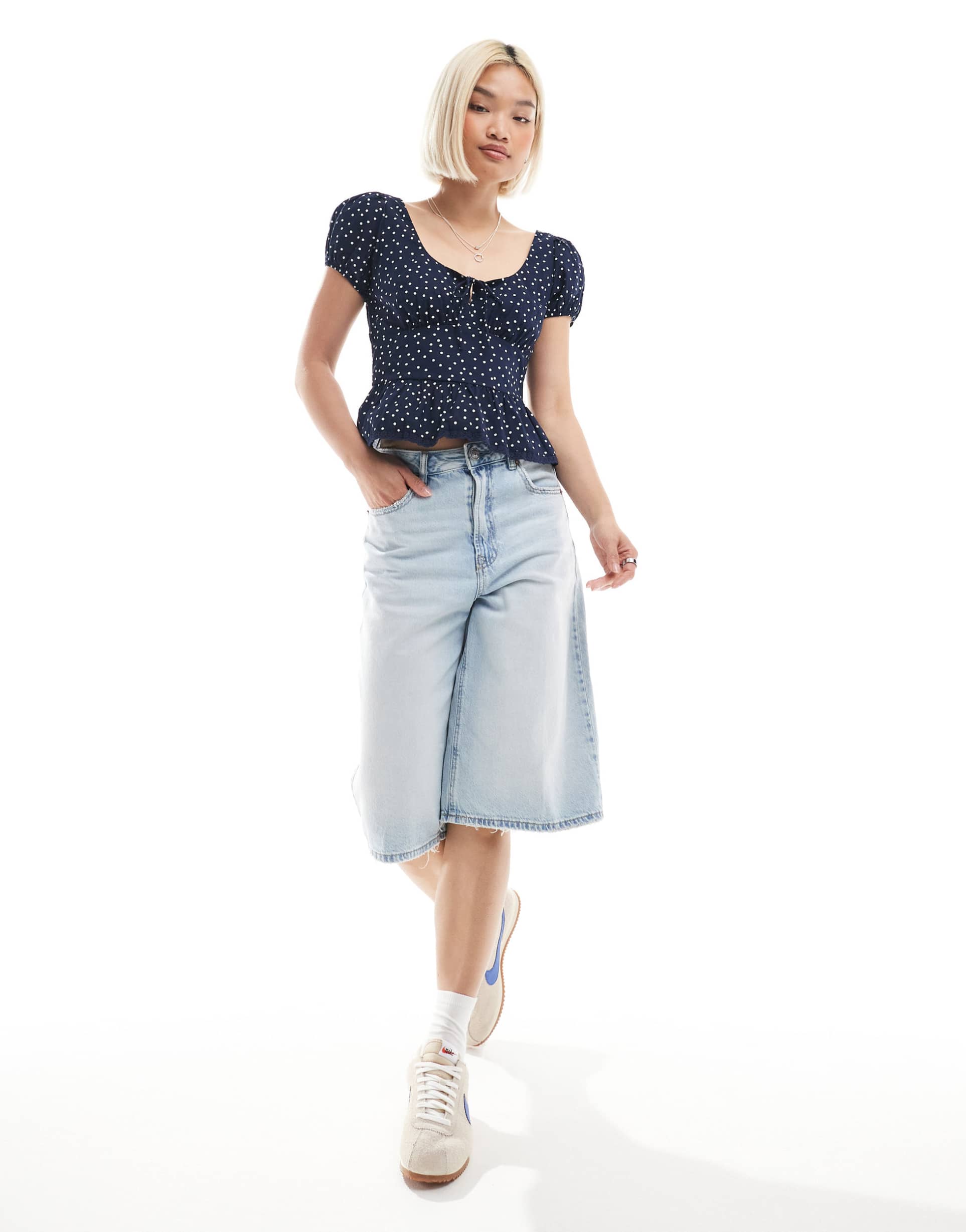 hollister milkmaid short sleeve top in navy polka dot