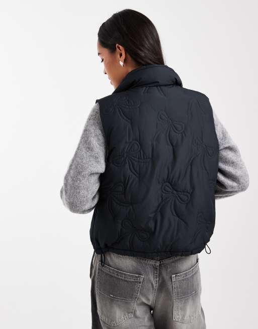 Hollister nylon puffer vest with bow pattern in black, 4 of 4