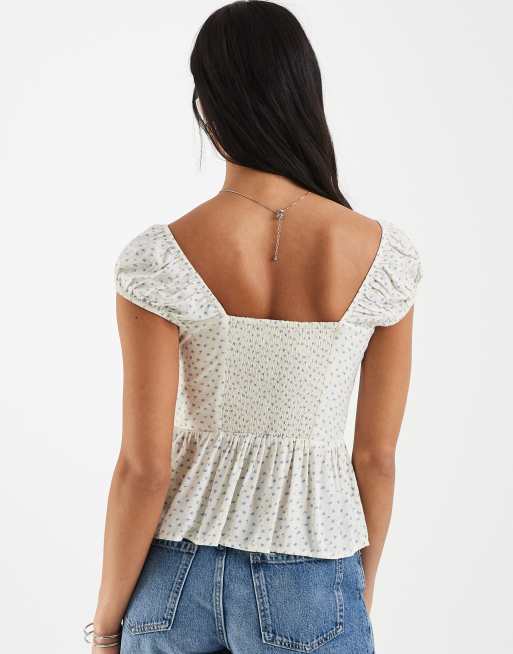 Hollister Oberteil mit Herzausschnitt und Schößchen in Hellgelb mit kleinem Blumenmuster, 4 von 4