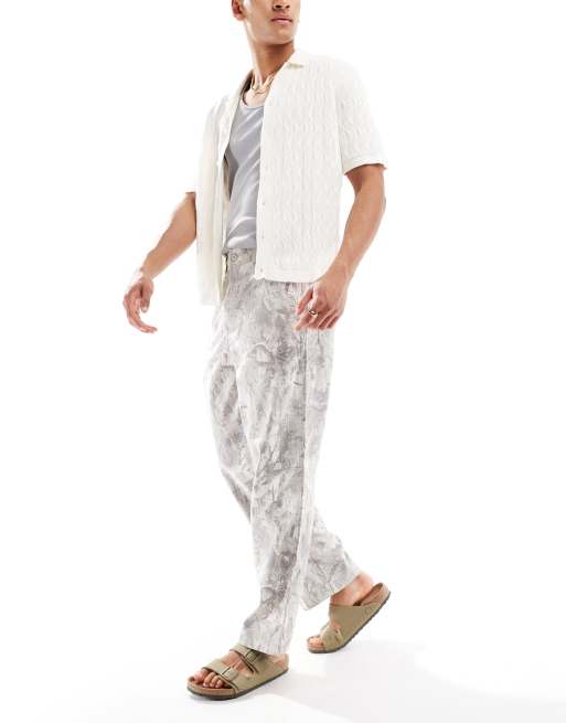 Hollister – Obszerne lniane spodnie ze wzorem moro
