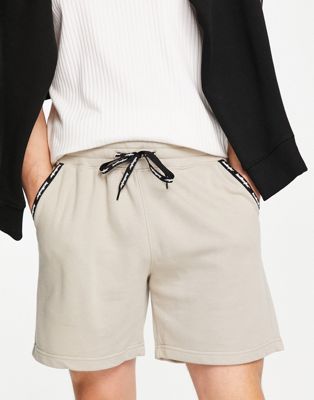 Hollister outdoor logo tape sweat shorts in tan co-ord - ASOS Price Checker