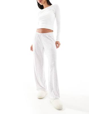 Hollister - Pantalon de pyjama baggy en tissu côtelé à imprimé cœurs - Blanc