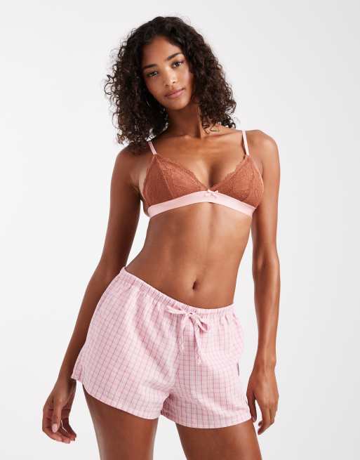 Hollister - Pantaloncini del pigiama rosa a quadri stile boxer con orlo con volant