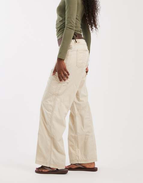 Hollister - pantalones de pernera ancha de talle bajo con detalle de bolsillo en crudo - view 1