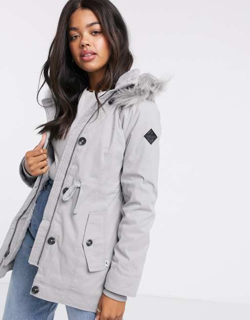 Hollister - Parka à doublure pelucheuse et capuche en fausse fourrure - Gris  | ASOS