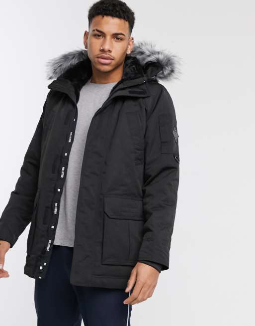 Hollister - Parka tous temps à capuche doublée en fausse fourrure - Noir |  ASOS